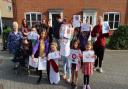 Youngsters and parents of Wilson Road in Stalham, where there a poster competition in the hopes of encouraging motorists to slow down.