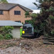 A Land Rover ploughed into a garden in Coltishall