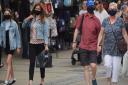 Shoppers wear masks in Norwich.