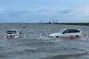 Two cars were seen floating on the high tide in Blakeney