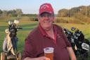 Donald Stuart enjoying a pint at the 19th hole at Mundesley Golf Club. A trophy has now been named after the inspirational former chairman of Mundesley Golf Club.