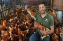 Jeremy Buxton with his 200 egg-laying Goldline hens, which will play their part in his regenerative agriculture plans for Eves Hill Farm at Booton
