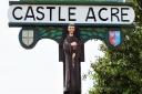 Castle Acre Priory graces the local village sign. Picture: Dr Andrew Tullett