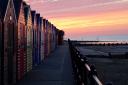 Beach huts at Mundesley at sunset. Picture: JULIE CAMERON