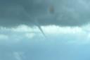 The waterspout was first spotted off the coast at Cley