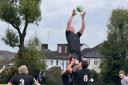 Holt Rugby Football Club's first team in action against Woodford