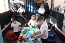 Litcham Primary School children enjoying their new play bus