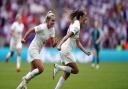 Lauren Hemp celebrates with Ella Toone, who opened the scoring for England