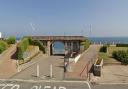 The arch on Sheringham's seafront, where The Leas public toilets can be found.