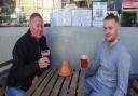 Phil and Alex Nichols enjoy a pint outside at The Gangway in Cromer. Picture: Danielle Booden