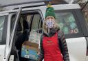 One of the volunteer delivery drivers - who only wished to give her first name, Mary, helping with this year's Christmas in Sheringham.