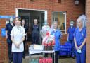 Staff at the North Walsham War Memorial Hospital receiving gifts and hampers from the hospital's Friends group..