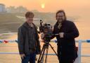Cameraman Bernd Fischer, left, and director Jens Meurer during the filming of Seaside Special, a film about the Cromer Pier Show.