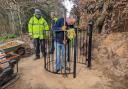 The refurbished kissing gate being installed in Love Lane, Cromer - Picture: Supplied by Tim Adams