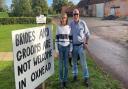 The owners of the farm which surrounds Oxnead Hall are among the neighbours who have raised complaints over the weddings held there. The signs pictured were removed after three weeks last year