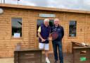 Cromer club chairman Kelvin van Hasselt, left, with tournament referee John Bruley  on the podium of the club’s new referees office