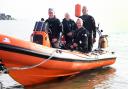Paul Hennessey, right, of Anglian Divers Club and Norfolk Wreck Research, with club members, from left, Tony Holmes, Roger Smith, and Rob Wade ready to set out from Sea Palling to a wreck site