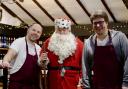 Father Christmas with staff at Picnic Fayre in Cley