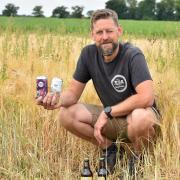 Wildcraft Brewery director Mike Deal with some of his firm's beers, now brewed at Worstead Farms