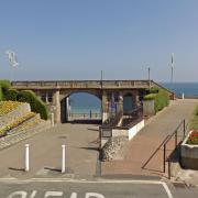 The arch on Sheringham's seafront, where The Leas public toilets can be found.