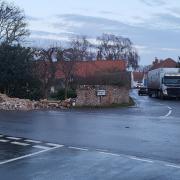 A man was charged with drink driving after his vehicle crashed into a wall and a tree in Blakeney. this image shows the damage to the wall.