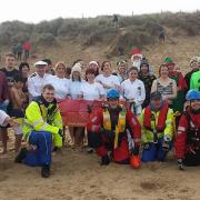 Participants in a past Sea Palling Boxing Day Dip.