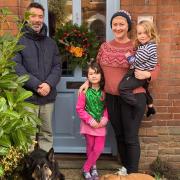 Gavin Haggart, Poppy Anderson-Haggart, Bertie Anderson-Haggart and Alfred Anderson-Haggart (L-R) are all delighted with the wreath gifted by a stranger.
