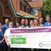 The Mount care home in Aylsham was given a free Samsung galaxy tablet by the Round Table. This picture shows the team celebrating their first Good CQC report in years in 2019. Picture: Stuart Anderson