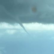 The waterspout was first spotted off the coast at Cley