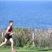 Ben Collinson on the 1st leg of the Round Norfolk Relay in Old Hunstanton. Picture: Ian Burt