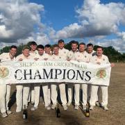 Sheringham Cricket Club's first team celebrating winning the league at Beccles