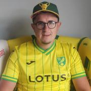 Norwich City fan George Wilbraham with his new chair
