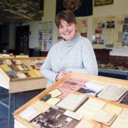 Jayne Andrew, learning officer, with some of the pocket diaries from 1800 to 2000, on exhibition at the Aylsham Heritage Centre. Photo: Denise Bradley.