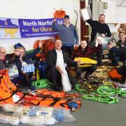 Co-ordinator Matt Cole, left, and the team from North Norfolk Aid For Ukraine, with just some of the rescue equipment, medical supplies and food they have collected. Picture: Denise Bradley