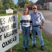 The owners of the farm which surrounds Oxnead Hall are among the neighbours who have raised complaints over the weddings held there. The signs pictured were removed after three weeks last year