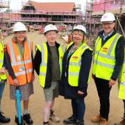 At the Northrepps site are, from left, Jenny Watson, chair, Broadland Housing; Angie Fitch-Tillet, Gavin Smith; Wendy Fredericks, Michael Newey and Andrew Savage