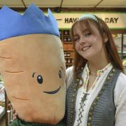 Emily Kate Anne, who plays the lead role in the upcoming Cinderella panto at Sheringham Little Theatre, with Colin the carrot