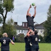 Holt Rugby Football Club's first team in action against Woodford