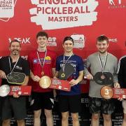 Will Taylor (third from right) won 1st place and a gold medal in the Advanced Men’s doubles 4.5 division, with partner Harrison Wood (holding the gold medal).