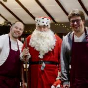 Father Christmas with staff at Picnic Fayre in Cley