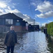 A Norfolk MP is planning a second major public flooding meeting after claiming Just Stop Oil protesters tried to 