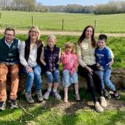 Enjoying north Norfolk life are, from left, Duncan Baker, his wife Nina and children Ukrainian Isabelle and Eleanor, and Anna Kolomiichuk with her son Sviatik.