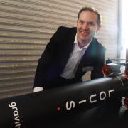 Rob Adlard, CEO of Gravitilab, with LOUIS, a microgravity research vehicle designed to test systems in a microgravity environment
