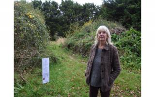 Avril Smith at the woodland site behind the North Walsham Garden Centre which is part of the site earmarked for new housing.