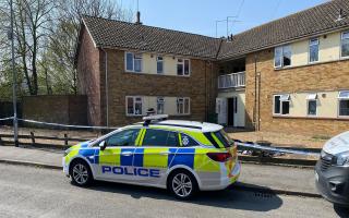 Three people have been arrested following the launch of a murder investigation after a woman died in King's Lynn.
